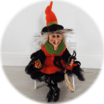 Gemüse-Hexe Möhrika erntet im Garten